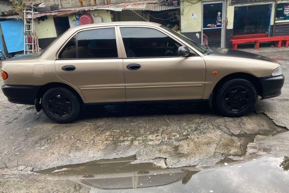 Golden Mitsubishi Lancer 1996 for sale in Caloocan