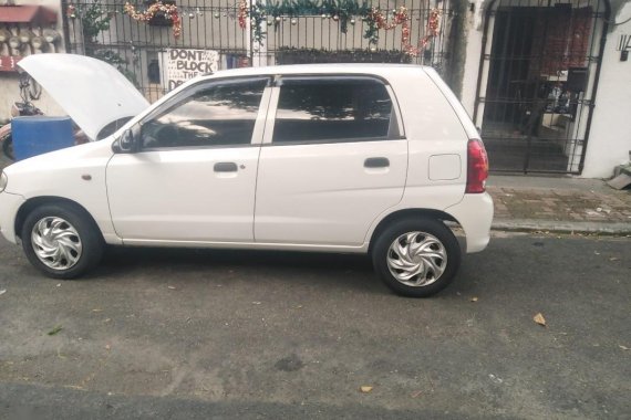 White Suzuki Alto 2013 for sale in Manila