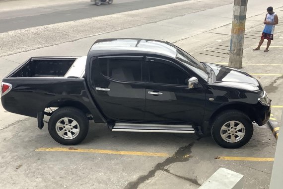 Black Mitsubishi Strada 2010 for sale in San Fernando