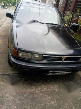 Black Mitsubishi Lancer 2004 for sale in Calamba