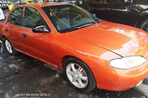 Orange Hyundai Elantra 2000 for sale in Taguig