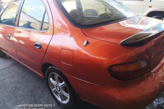 Orange Hyundai Elantra 2000 for sale in Taguig