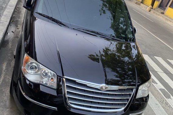 Selling Black Chrysler Town And Country 2010 in Pasig