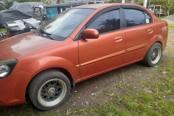 Orange Kia Rio 2015 for sale in San Pablo City