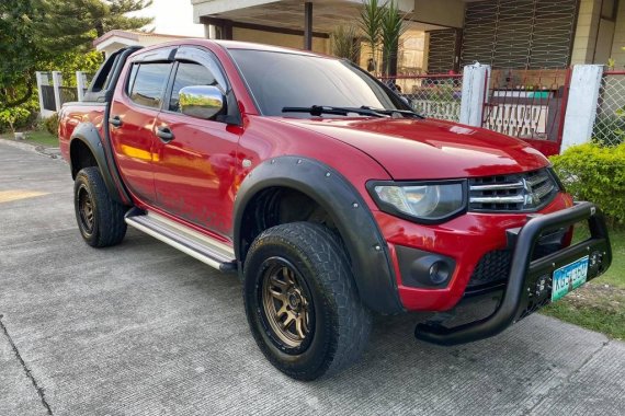 Selling Red Mitsubishi Strada 2013 in Cebu City