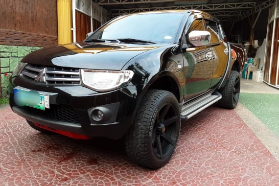 Sell Black 2012 Mitsubishi Strada in Manila