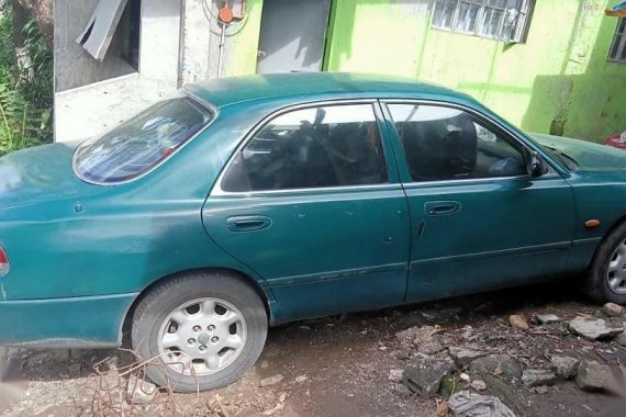 Selling Green Mazda 626 1998 in Navotas