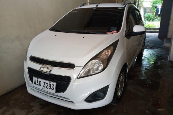 Pearl White Chevrolet Spark 2014 for sale in Manila