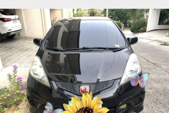 Black Honda Jazz 2010 for sale in Nasipit