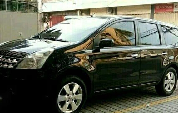 Selling Black Nissan Grand Livina 2012 in Quezon