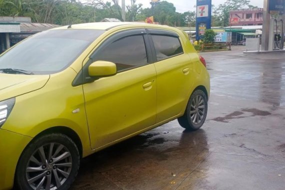 Selling Yellow Mitsubishi Mirage 2013 in Tabaco