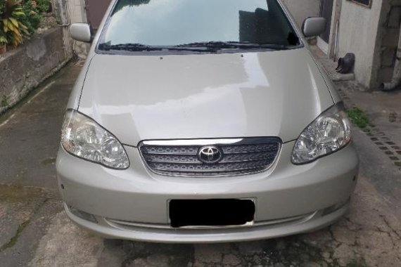 Pearlwhite Toyota Corolla Altis 2011 for sale in Quezon
