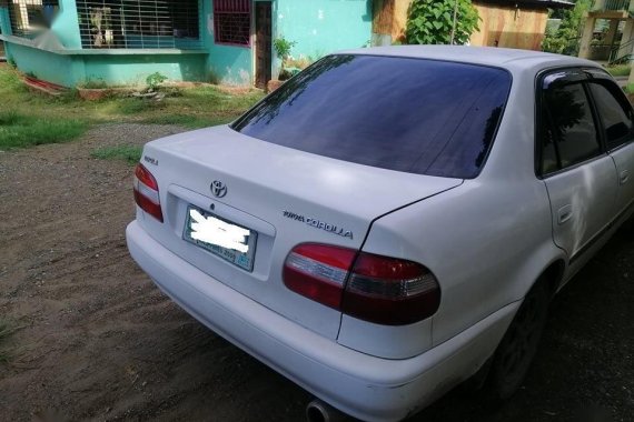 White Toyota Corolla 1999 for sale in Pinamungajan