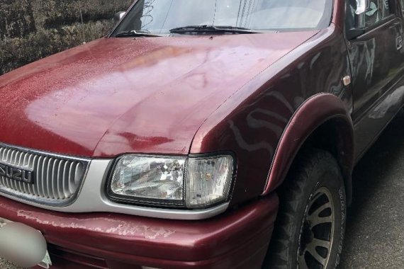 Selling Red Isuzu Fuego 2006 in Quezon
