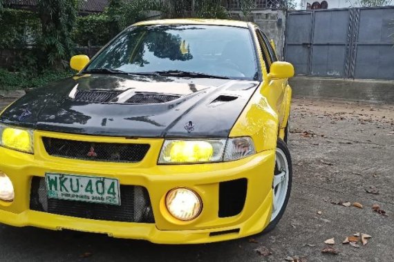 Selling Yellow Mitsubishi Lancer Evolution 1998 in Pasig