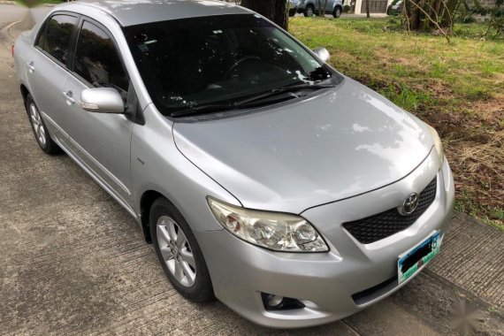 Brightsilver Toyota Corolla Altis 2010 for sale in Quezon