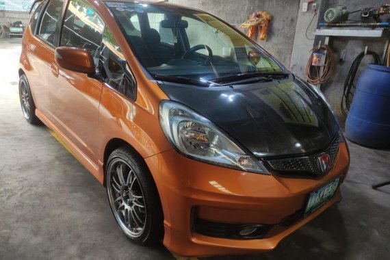 Selling Orange Honda Jazz 2012 in Valenzuela