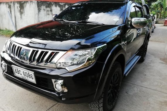 2016 MITSUBISHI STRADA MT with mags and canopy