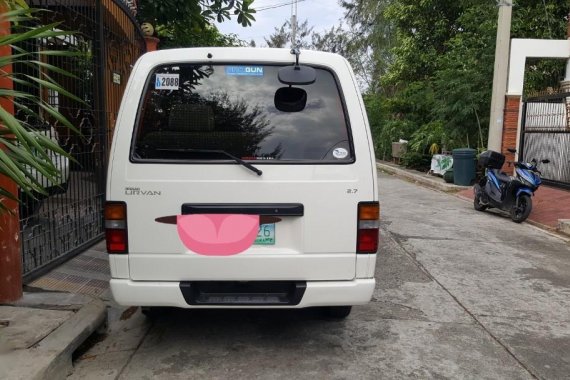 Selling Pearl White Nissan Urvan 2011 in Laguna