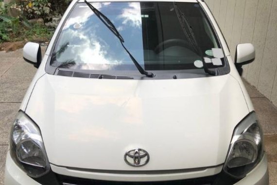 Pearl White Toyota Wigo 2015 for sale in San Mateo