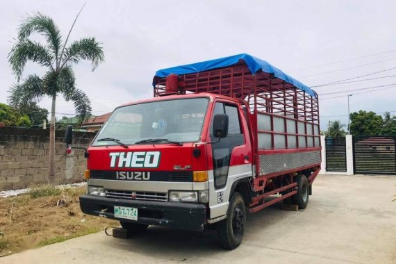 Sell Red 1992 Isuzu Elf in Balayan