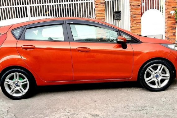 Selling Orange Ford Fiesta 2013