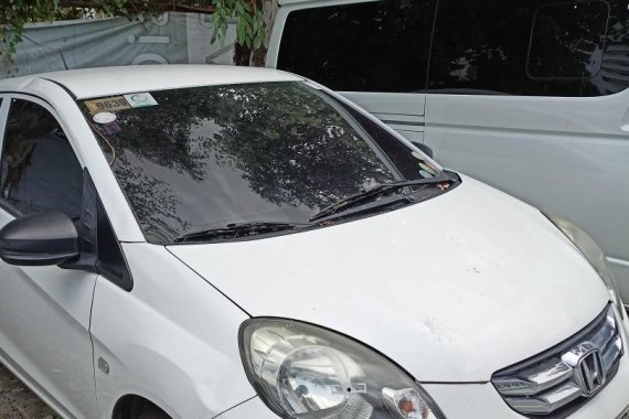 White Honda Brio Amaze 2016