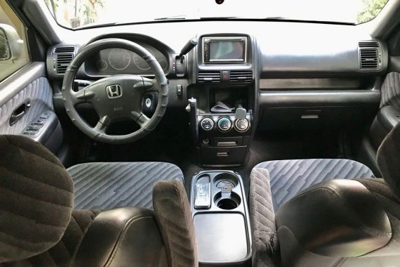 Brightsilver Honda CR-V 2004 for sale in Quezon
