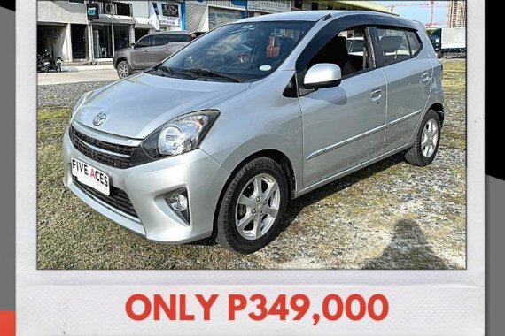 Selling Brightsilver Toyota Wigo 2016 in Mandaue