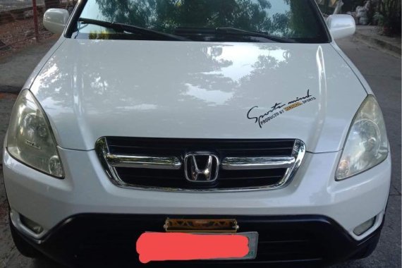 Selling White Honda CR-V 2004 in Makati