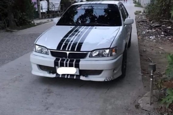 Selling White Toyota Corolla 2004 in Baliuag