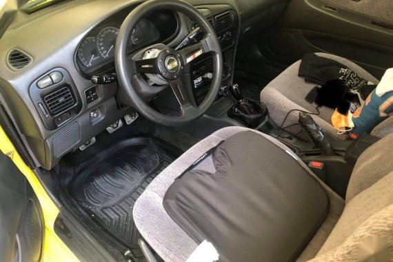 Yellow Mitsubishi Lancer 1994 for sale in Pateros