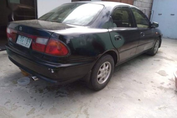 Black Mazda 323 1997 for sale in Parañaque