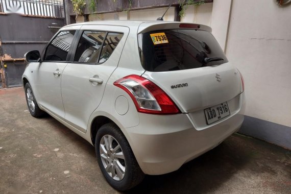 Selling Pearl White Suzuki Swift 2015 in Quezon City