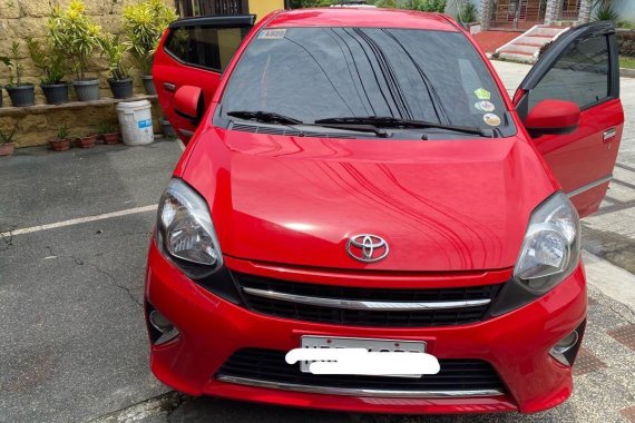 Selling Red Toyota Wigo 2016 in Quezon City