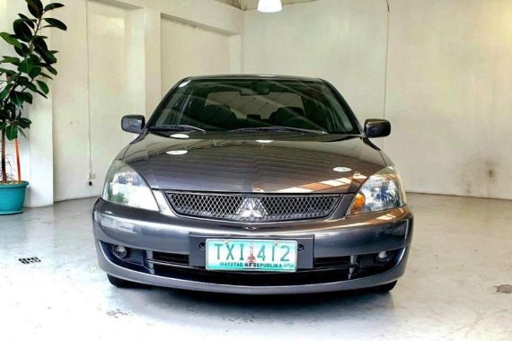 Selling Greyblack Mitsubishi Lancer 2011 in Quezon City