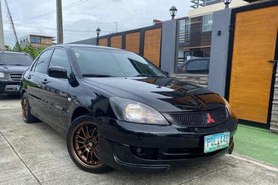 Selling Black Mitsubishi Lancer 2011 in Manila