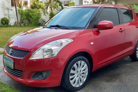 Sell Red 2011 Suzuki Swift in Parañaque