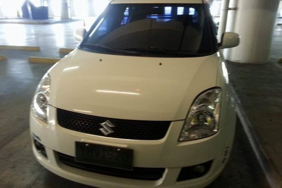 Sell White 2010 Suzuki Swift in Talisay