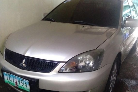 Sell Silver 2011 Mitsubishi Lancer in Bustos