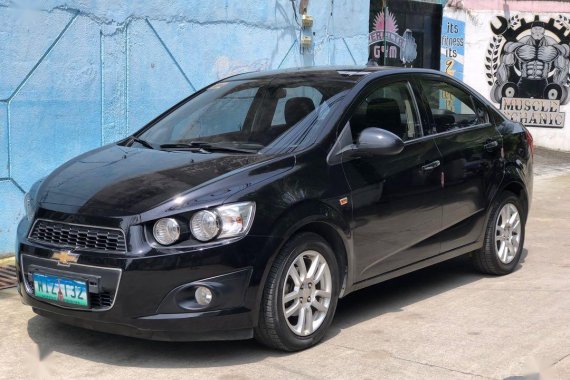 Black Chevrolet Sonic 2013 for sale in Samal