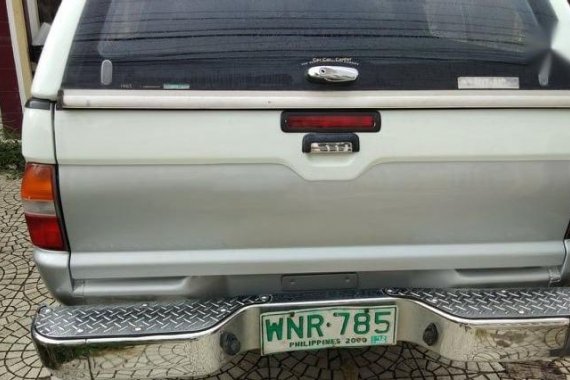Pearl White Mitsubishi Strada 2000 for sale in Paranaque