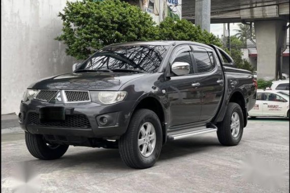 Black Mitsubishi Strada 2012 for sale in Jaen