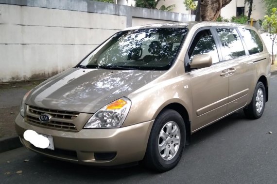 Beige Kia Carnival 2009 for sale in Subic