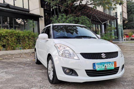 Pearl White Suzuki Swift 2013 for sale in Automatic