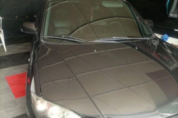 Selling Black Mazda 3 2005 in Bulakan
