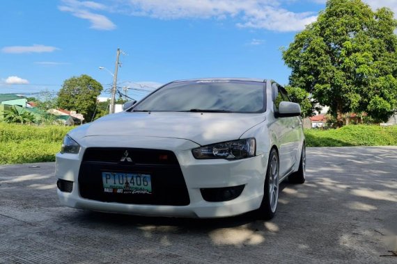 White Mitsubishi Lancer 2010 for sale in Muntinlupa 