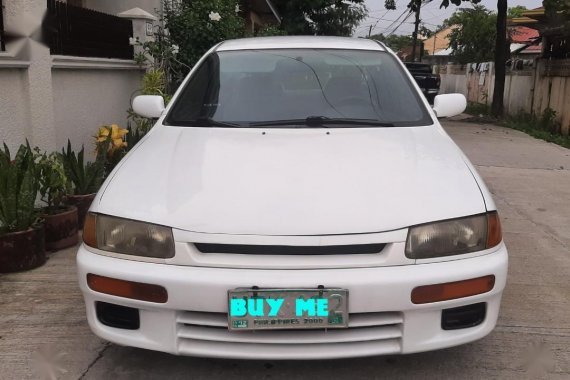 Selling White Mazda 323 1997 in Noveleta