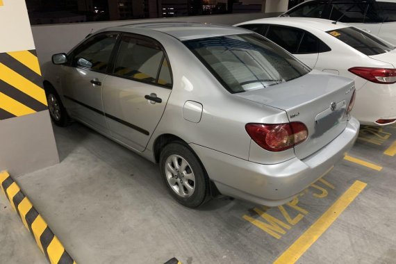 Selling Brightsilver Toyota Corolla Altis 2005 in Manila