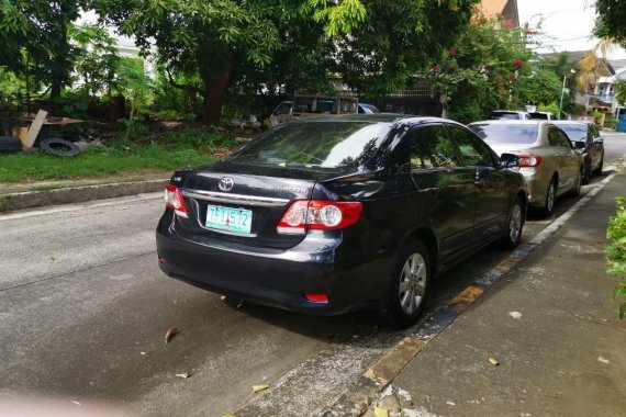 Selling Black Toyota Corolla Altis 2011 in Quezon